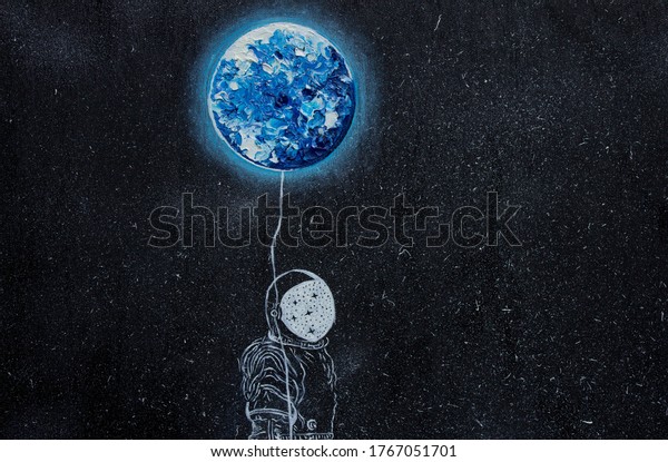 Oil
painting. The astronaut and the earth.
Background.