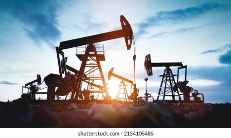 Oil pump jack work on oilfield. Drill and petroleum extraction 3d render