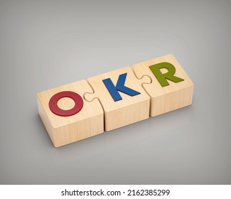 OKR. Objectives And Key Results Symbol. Concept Words OKR On Puzzle Wood. 3d Illustration