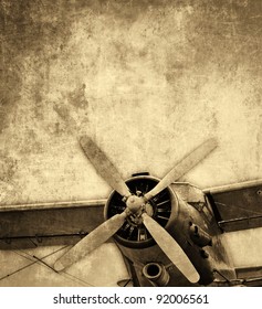 Old aircraft, vintage background 					
