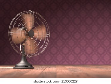 Old antique fan on a wooden floor with retro background.