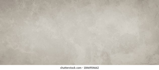 Old brown paper parchment background design with distressed vintage texture; and white faded marbled center; elegant antique beige color