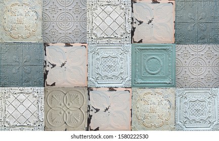Old decorative painted tin ceiling tiles. Seamless pattern.