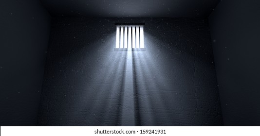 An old jail cell interior with barred up window with light rays penetrating through it reflecting the image on the floor