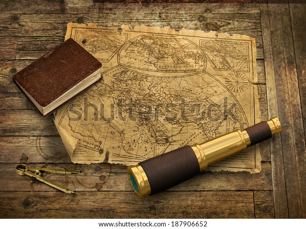 Old nautical map with telescope and logbook,\
navigation concept