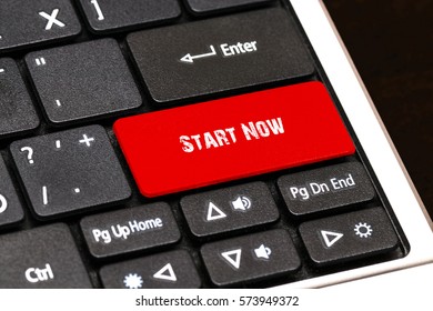 On the laptop keyboard the red button written Start Now.
