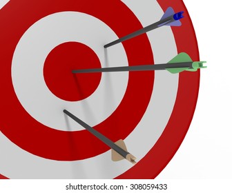 One green arrow shot into the bulls-eye of a red and white archery target with one blue and one brown arrow missing the bulls-eye