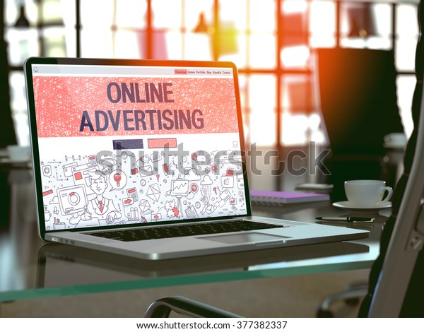 Online\
Advertising Concept. Closeup Landing Page on Laptop Screen in\
Doodle Design Style. On Background of Comfortable Working Place in\
Modern Office. Blurred, Toned Image. 3D\
Render.