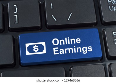 Online earnings computer keyboard button. Concept of earnings money with Internet technology.