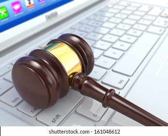 Online Judgement. Gavel On Laptop. Conceptual Image. 3d