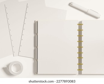 Open discbound planner mockup on desk and blank planner inserts with white stationery. Top view flatlay as a realistic 3d rendering.
