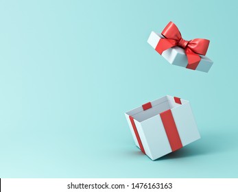 Open gift box or present box with red ribbon and bow isolated on green blue pastel color background with shadow 3D rendering