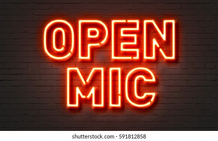 Open Mic Neon Sign On Brick Wall Background