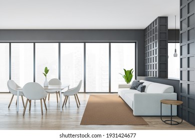 Open Space Home Interior With White Sofa, Side View, Wooden Furniture And White Chairs. Large Windows With City View And Skyscrapers, 3D Rendering No People 