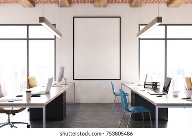 Open Space Office Interior With White Walls, Computer Desks, Blue Chairs And A Framed Vertical Poster. 3d Rendering Mock Up