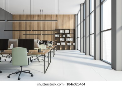 Open Space Office, Tables With Computers. Bookshelf With Folders Near Wooden Wall. Work Space Of Office, No People, 3D Rendering