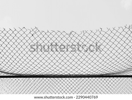 Similar – boy leaning on fence