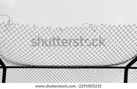 Similar – boy leaning on fence