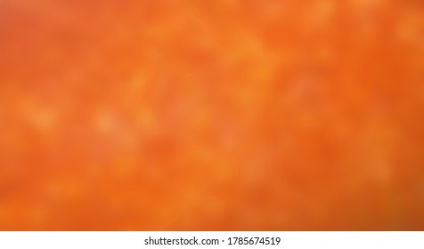 Orange brown smooth cloudy subdued mystic abstract background
