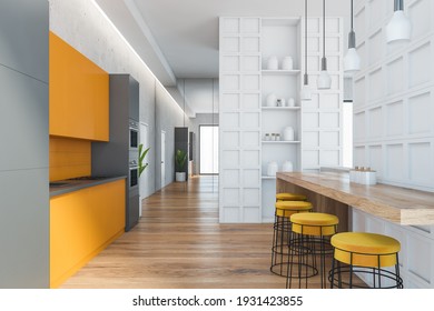Orange And White Kitchen With Wooden Table And Bar Chairs, Parquet Floor. Dining Room In Open Space Apartment, 3D Rendering No People