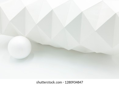 origami background with white sphere in white background