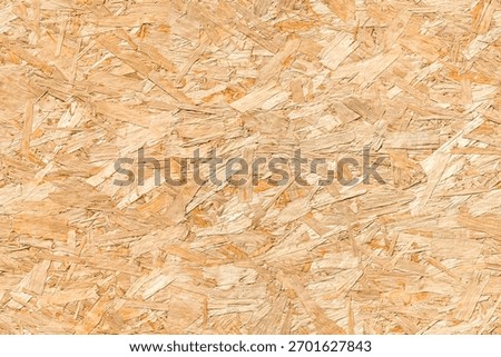 OSB Oriented strand board seamless background texture – pattern of flat fibreboard building panel from wooden chip material used in DIY, domestic and commercial construction.