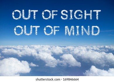 out of sight out of mind cloud word on sky