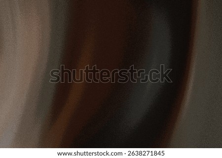 An out-of-focus image showcasing a vertical blend of brown and dark hair tones. The blurry effect creates an abstract, almost painterly feel.