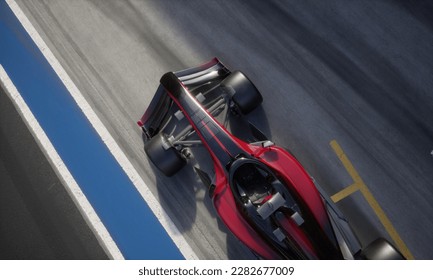 Overhead high angle view of a red modern generic sports racing car driving out from pitlane garage, cinematic lighting. Daytime shot. Realistic 3d rendering. 3D Illustration