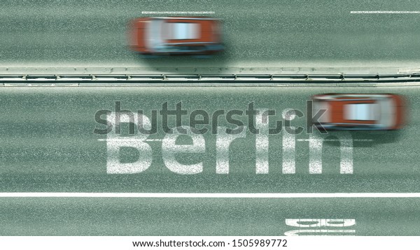 Overhead view of the busy car road with Berlin\
text. Travel to Germany 3D\
rendering