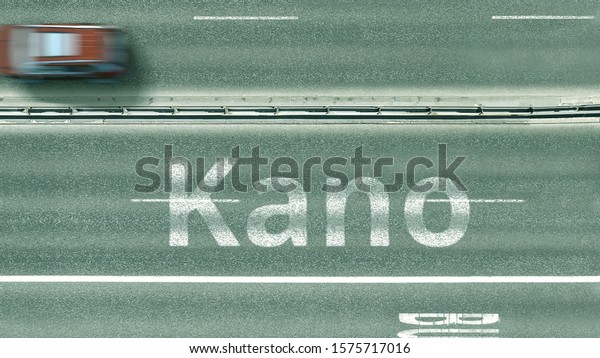 Overhead view of the busy car road with Kano
text. Travel to Nigeria 3D
rendering