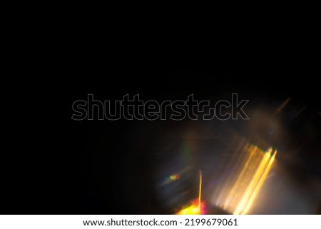 Overlay or screen filter effect - Blur colorful rainbow crystal light leaks on black background. Defocused abstract multicolored retro film lens flare bokeh analog photo. Glow Vintage prism colors