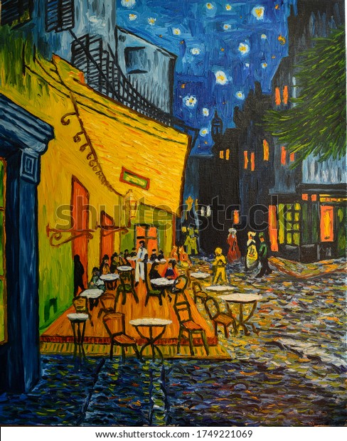 Painting oil on canvas. Free copy based on the famous painting by Vincent Van Gogh - Cafe Terrace on Forum Square, Arles, 1888.