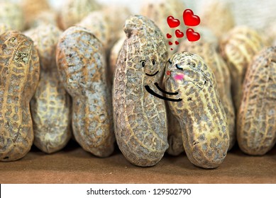 pair of peanuts hugging in nutty crowd