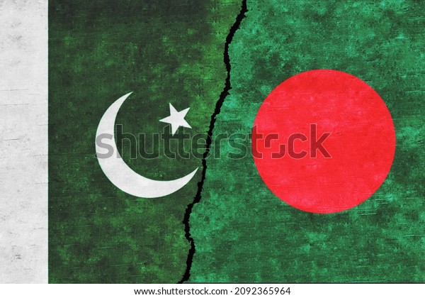 Pakistan and Bangladesh painted\
flags on a wall with a crack. Bangladesh and Pakistan relations.\
Pakistan and Bangladesh flags together. Pakistan vs\
Bangladesh