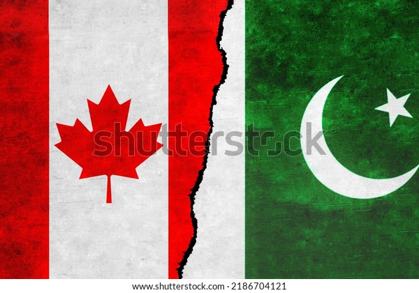 Pakistan and Canada painted flags on a wall with\
a crack. Pakistan and Canada relations. Canada and Pakistan flags\
together