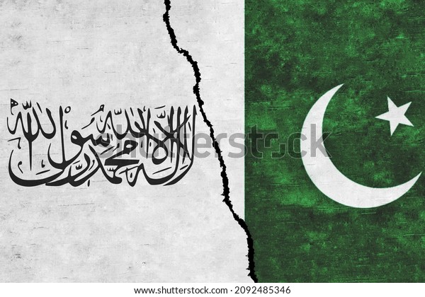 Pakistan and Taliban painted flags on a\
wall with a crack. Pakistan and Taliban relations. Islamic Emirate\
of Afghanistan and Pakistan flags\
together
