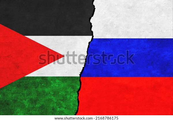 Palestine and Russia painted flags on a wall\
with a crack. Palestine and Russia relations. Russia and Palestine\
flags together