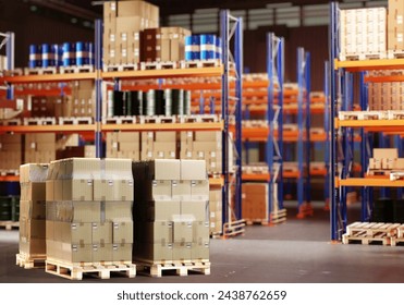 Pallets of Packaged Goods in Warehouse with Storage Racks 3d image - Powered by Shutterstock