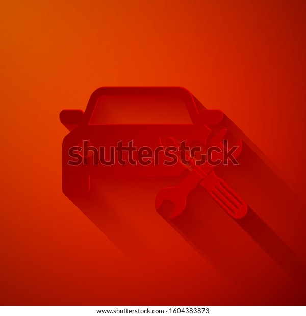 Paper cut Car with screwdriver\
and wrench icon isolated on red background. Adjusting, service,\
setting, maintenance, repair, fixing. Paper art style.\
