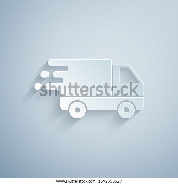 Paper cut\
Delivery truck in movement icon isolated on grey background. Fast\
shipping delivery truck. Paper art style.\
