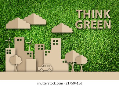  Papierschnitt des Ökos auf grünem Gras