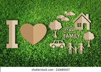  Paper cut of family on green grass - Shutterstock ID 210685657