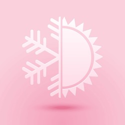 Paper Cut Hot And Cold Symbol. Sun And Snowflake Icon Isolated On Pink Background. Winter And Summer Symbol. Paper Art Style.