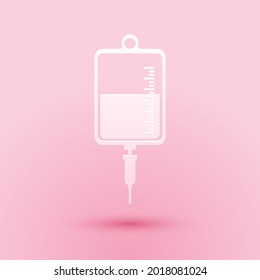 Paper cut IV bag icon isolated on pink background. Blood bag icon. Donate blood concept. The concept of treatment and therapy, chemotherapy. Paper art style. .
