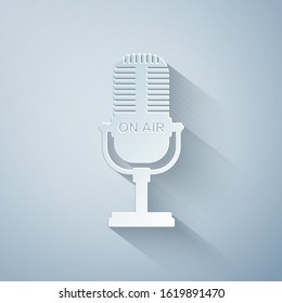 Paper Cut Microphone Icon Isolated On Grey Background. On Air Radio Mic Microphone. Speaker Sign. Paper Art Style