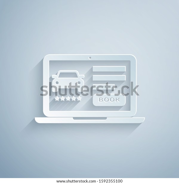 Paper cut Online car sharing icon isolated on\
grey background. Online rental car service. Online booking design\
concept for laptop. Paper art style.\
