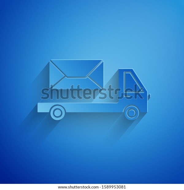 Paper cut Post truck icon isolated on blue background.\
Mail car. Vehicle truck transport with envelope or letter. Paper\
art style. 