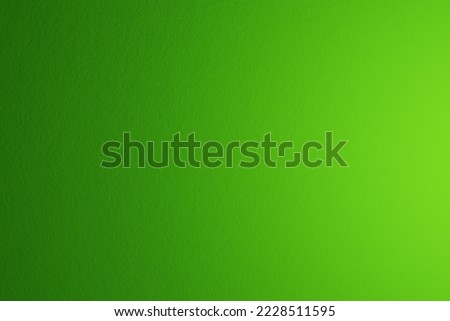 Paper texture, abstract background. The name of the color is nebula green. Gradient with light coming from right