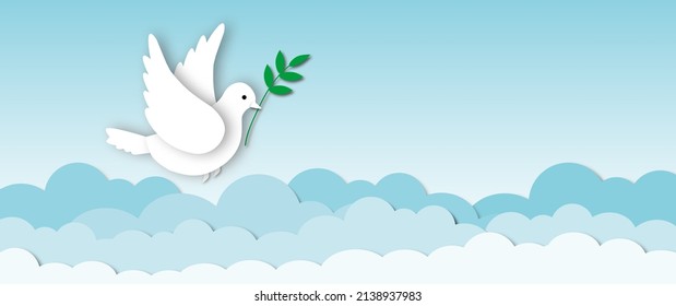 Paper White Dove Or Pigeon Carrying Olive Branch Flying In Cloudy Sky Background, Concept For World Peace Day, International Day Of Peace, Space For The Text, Paper Cut Design Style.